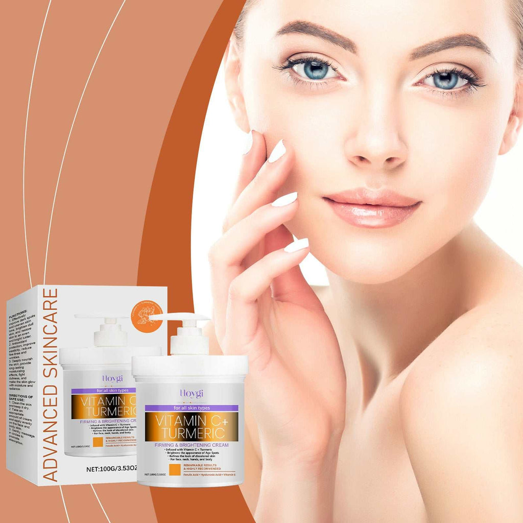 Turmeric Vitamin C firming and brightening skin cream jar with turmeric roots and vitamin C fruits on white background