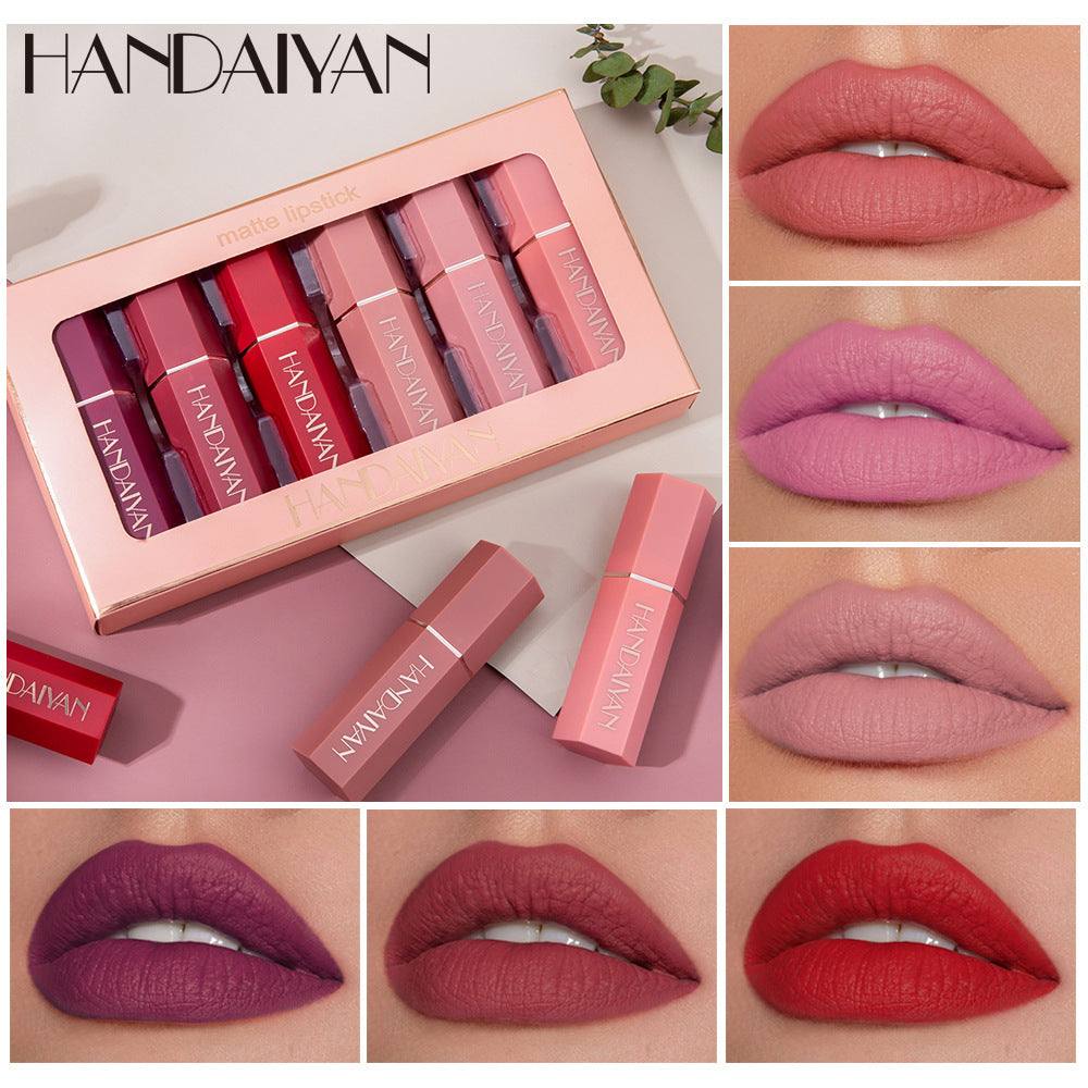 Elegant lipstick set box with six glossy shimmer lipsticks in hexagonal design
